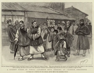 En gatescene i Tokio, japanske gutter Jerring hos kinesiske innbyggere